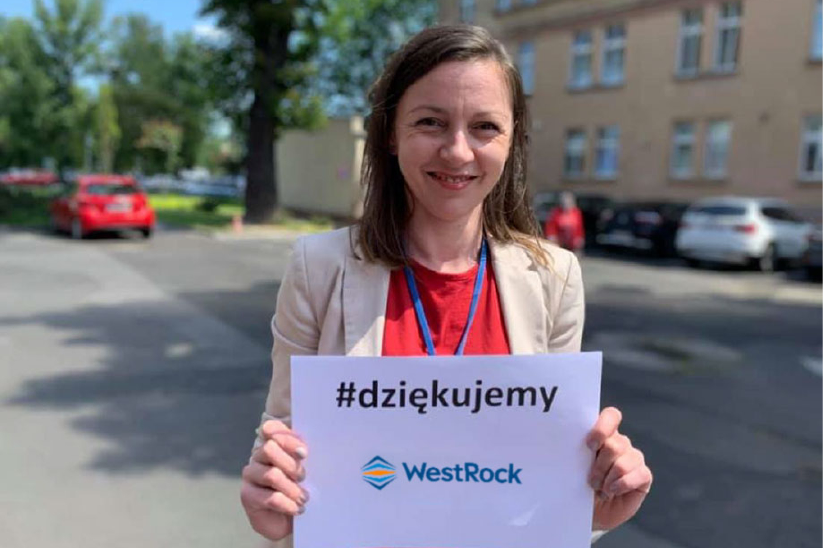 Woman holding WestRock sign in Polish
