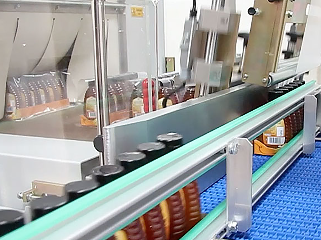 Automatic shrink wrapper collator trays