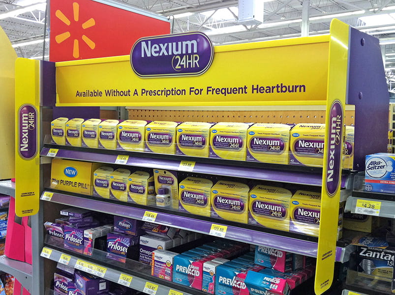 Nexium launch inline permanent merchandising display at Walmart
