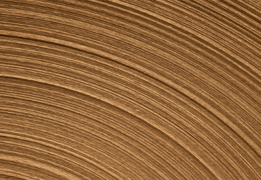 A side view of brown containerboard roll