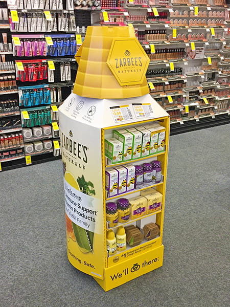 Health and beauty floor stand display at retail