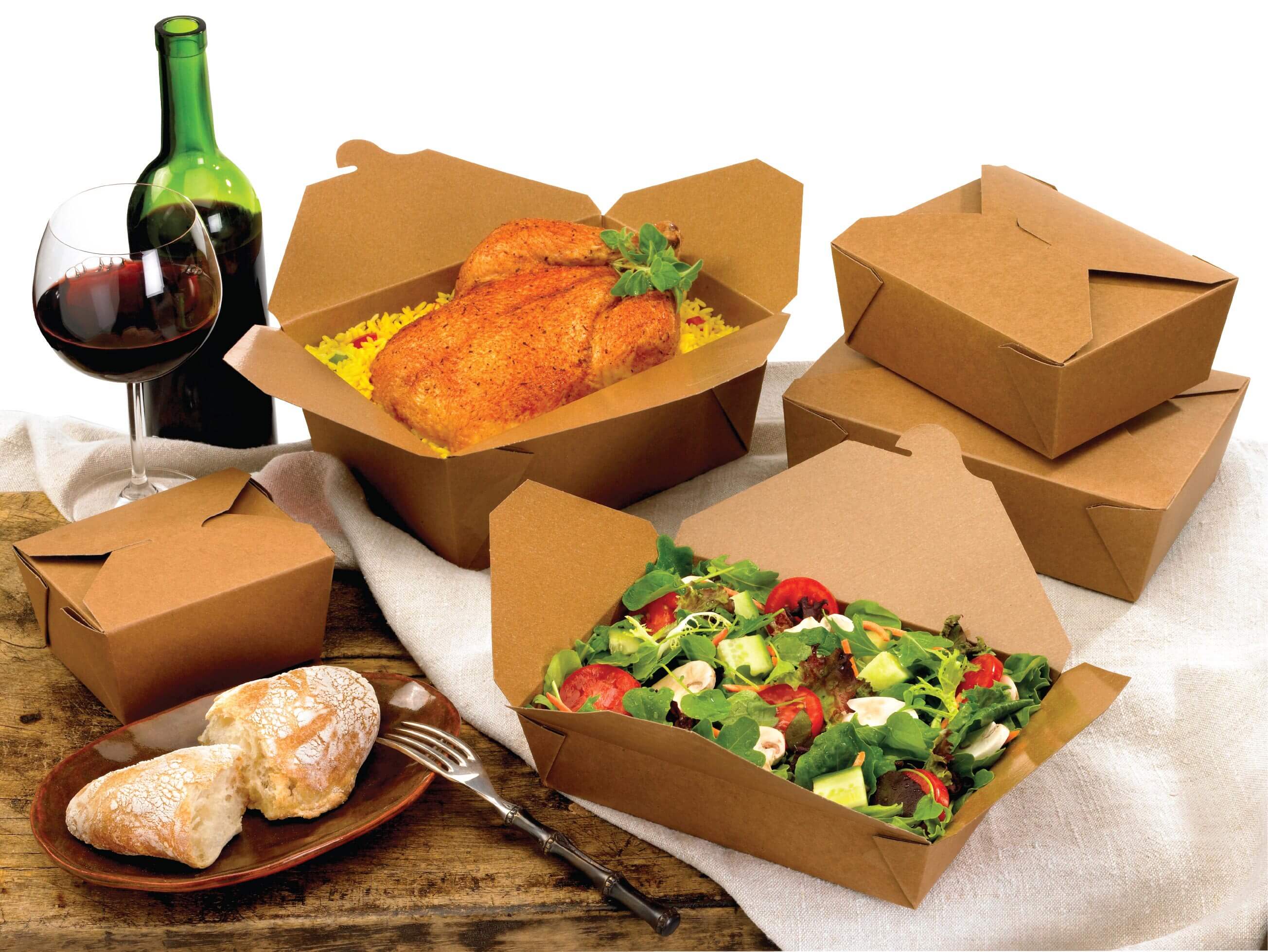 A group shot of Bio-Plus Terra II folding carton containers holding chicken and salad.